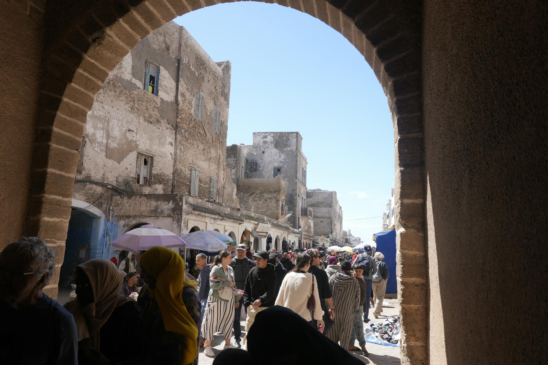 Whitewashed walls and blue doorways in a traditional North African medina