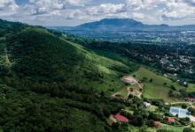 Misty highland village in the Usambara Mountains of Tanzania surrounded by green hills