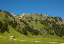 Sweeping highland meadow beneath rugged mountain peaks in Turkey's Kaçkar range