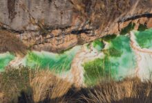 Aerial view of the deep Colca Canyon with terraced walls in Peru