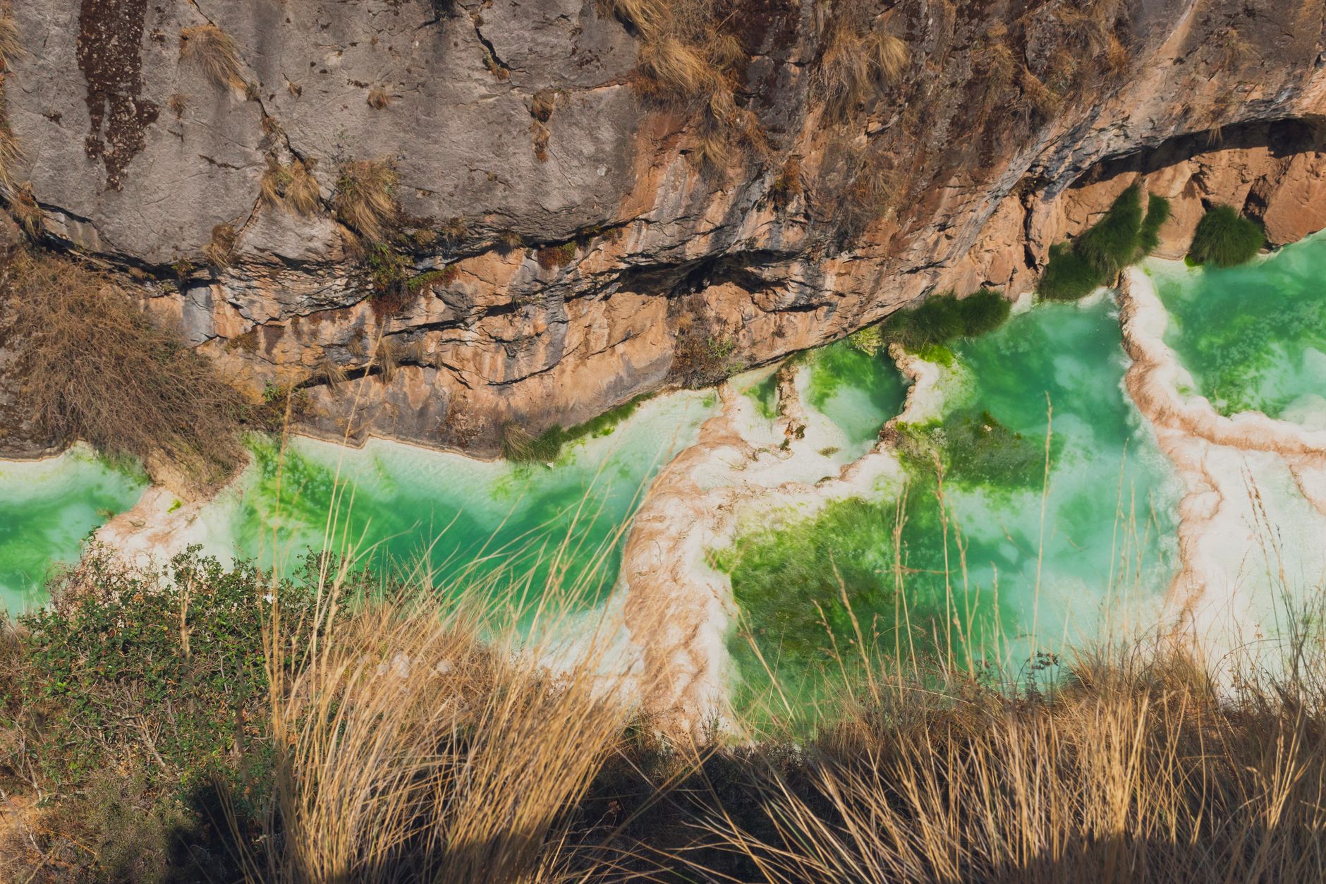 Aerial view of the deep Colca Canyon with terraced walls in Peru