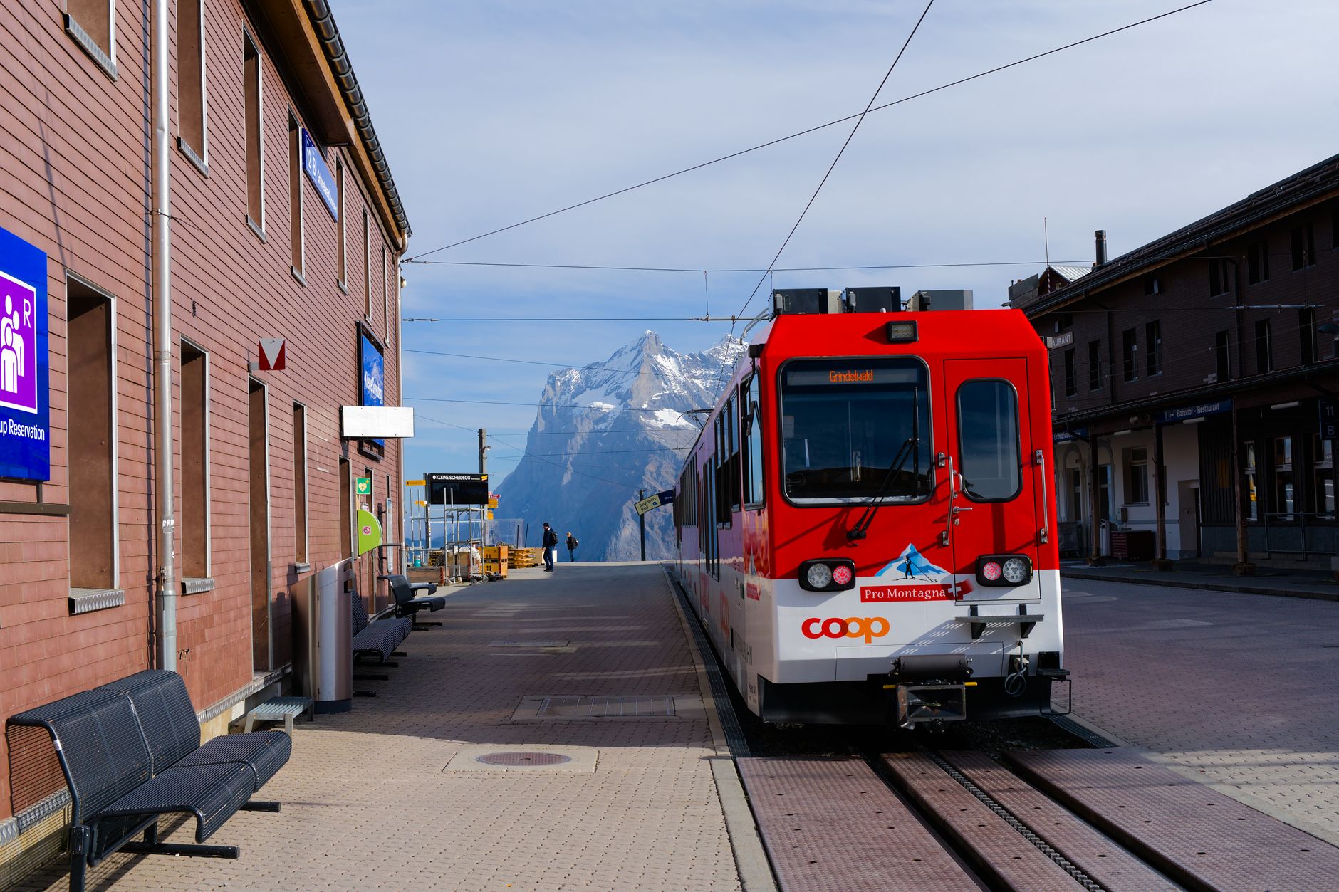 Scenic railway train winding through mountainous terrain