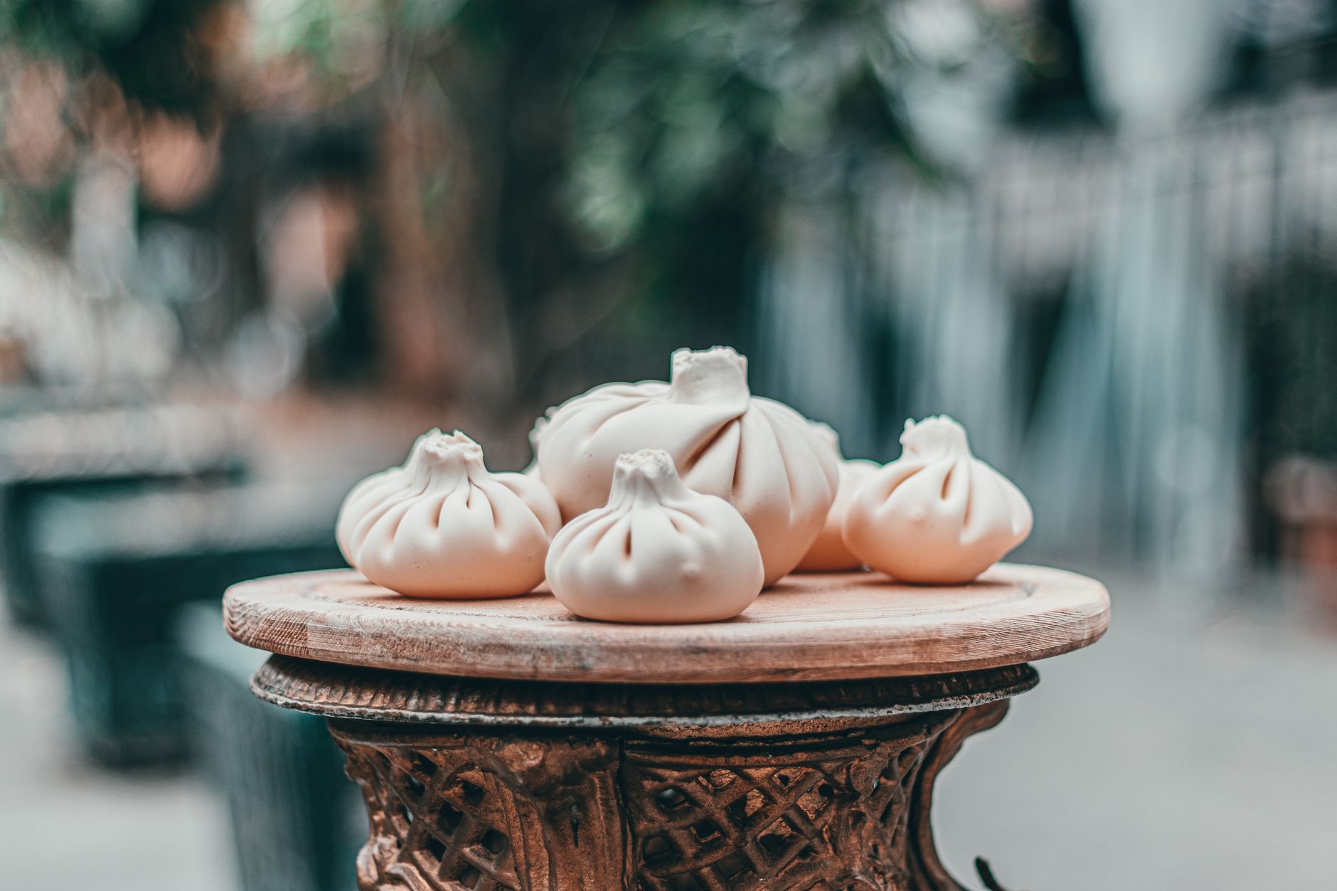Plate of Georgian khinkali soup dumplings served at a traditional restaurant table
