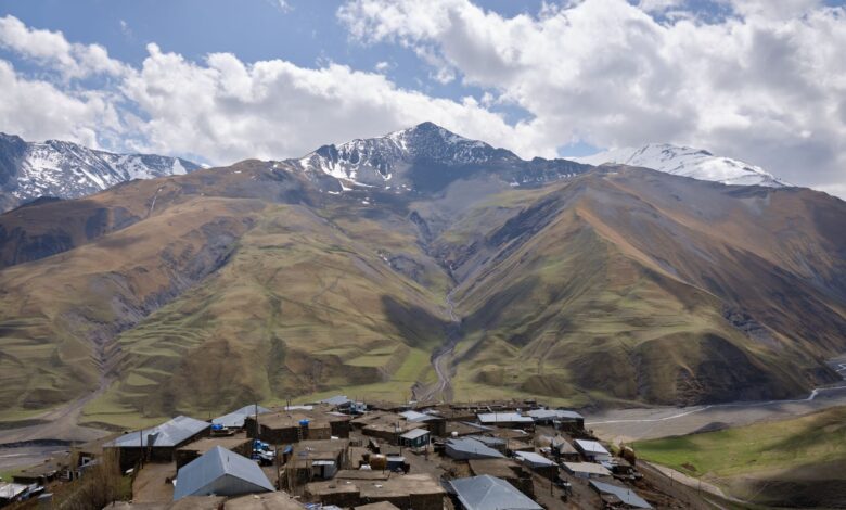 Stone tower village perched on a Caucasus mountain ridge in Georgia's Tusheti region