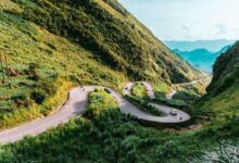Winding mountain road through dramatic karst landscape in northern Vietnam