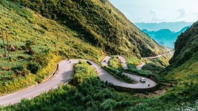 Winding mountain road through dramatic karst landscape in northern Vietnam