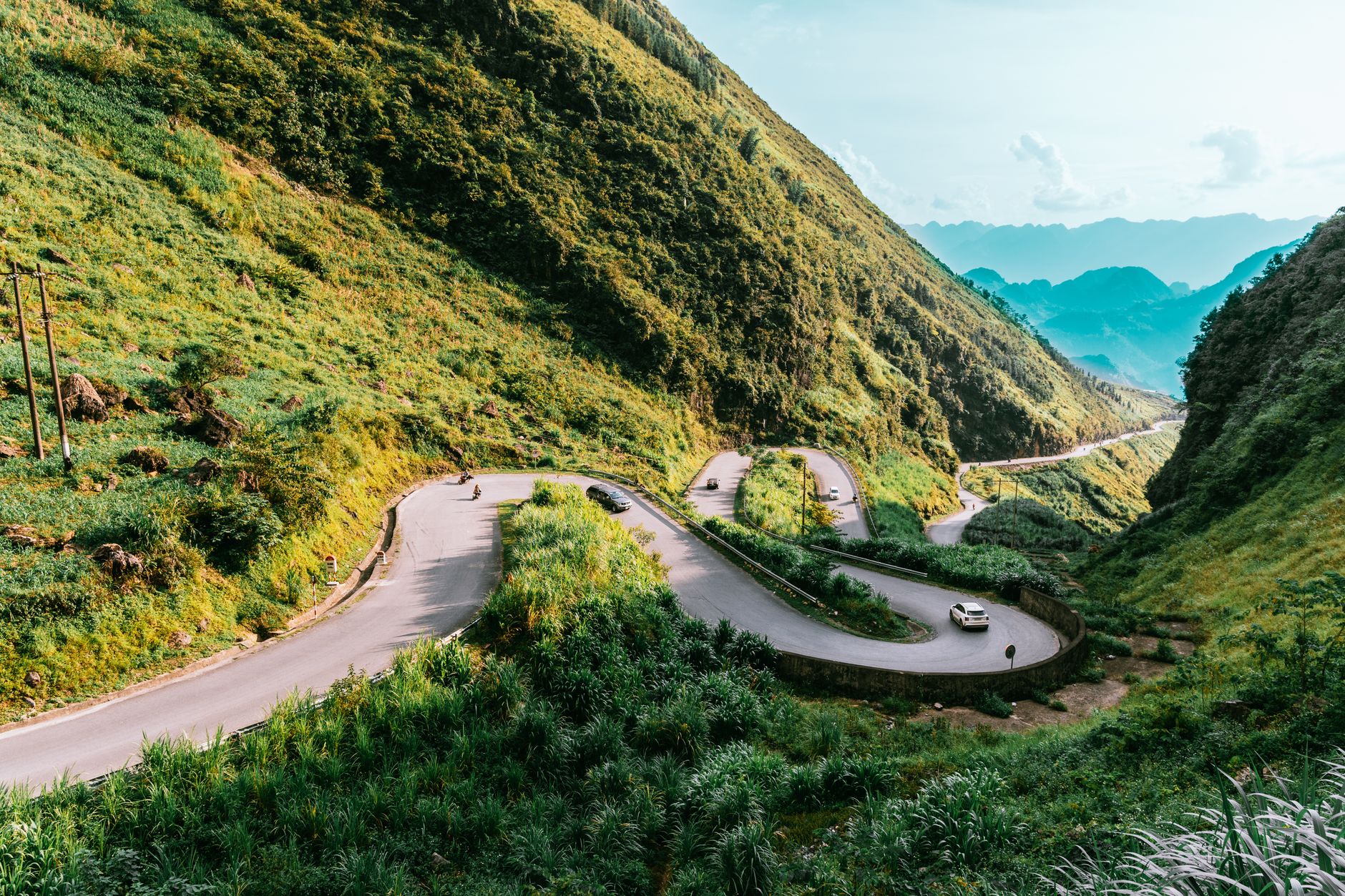 Winding mountain road through dramatic karst landscape in northern Vietnam