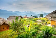 A remote highland village in Myanmar surrounded by forested hills