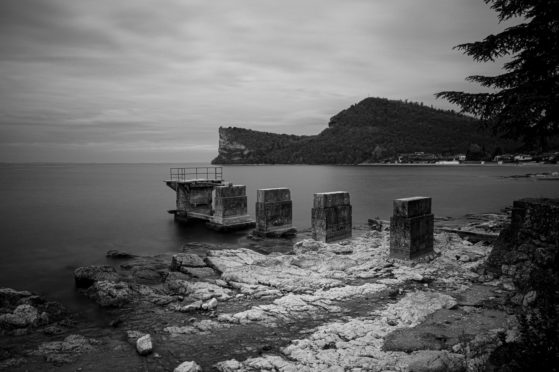 Stone ruins of an ancient trading city overlooking a coastal lagoon