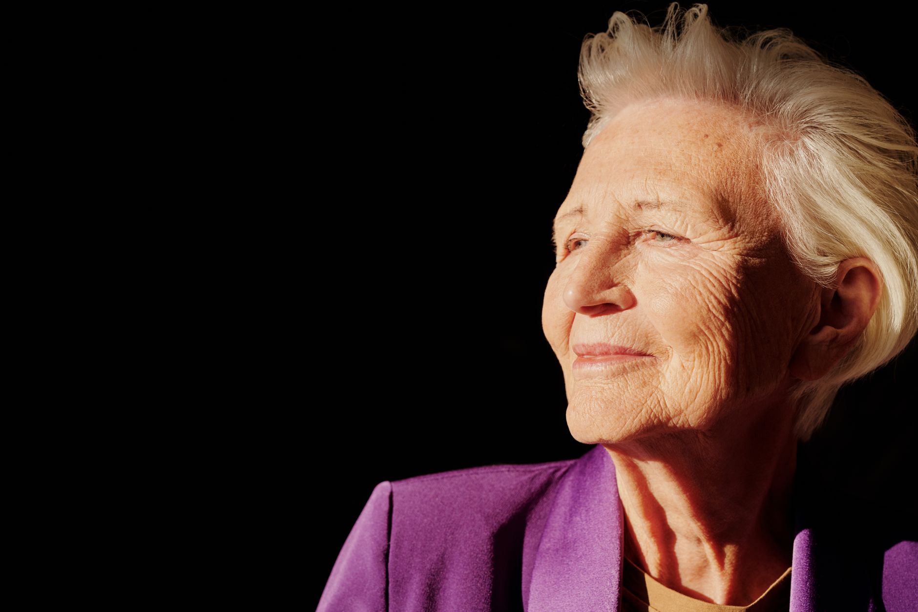 Close portrait of an elderly woman in traditional dress
