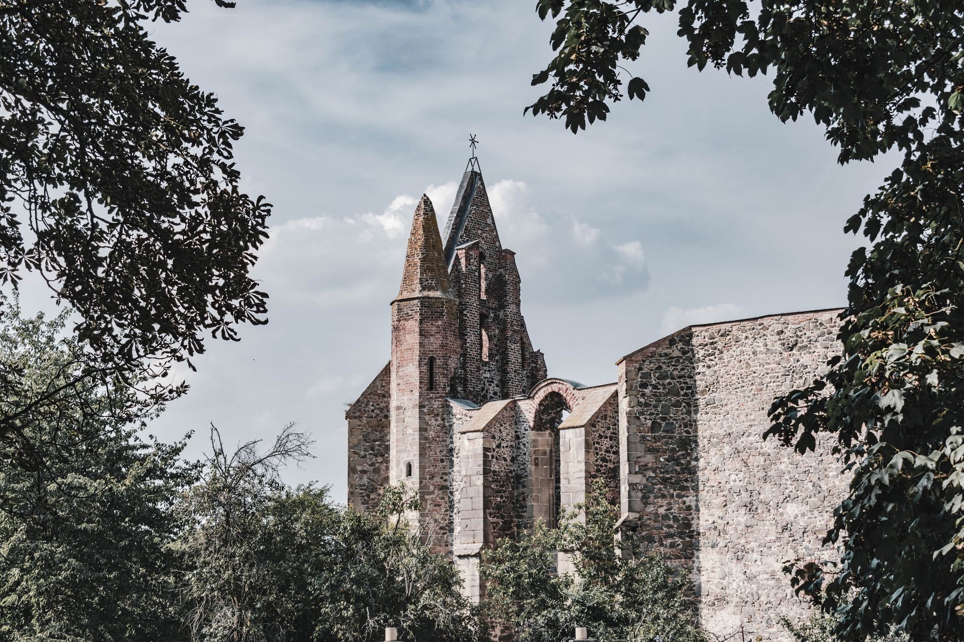 Medieval stone church with carved khachkar cross-stones in the Caucasus region