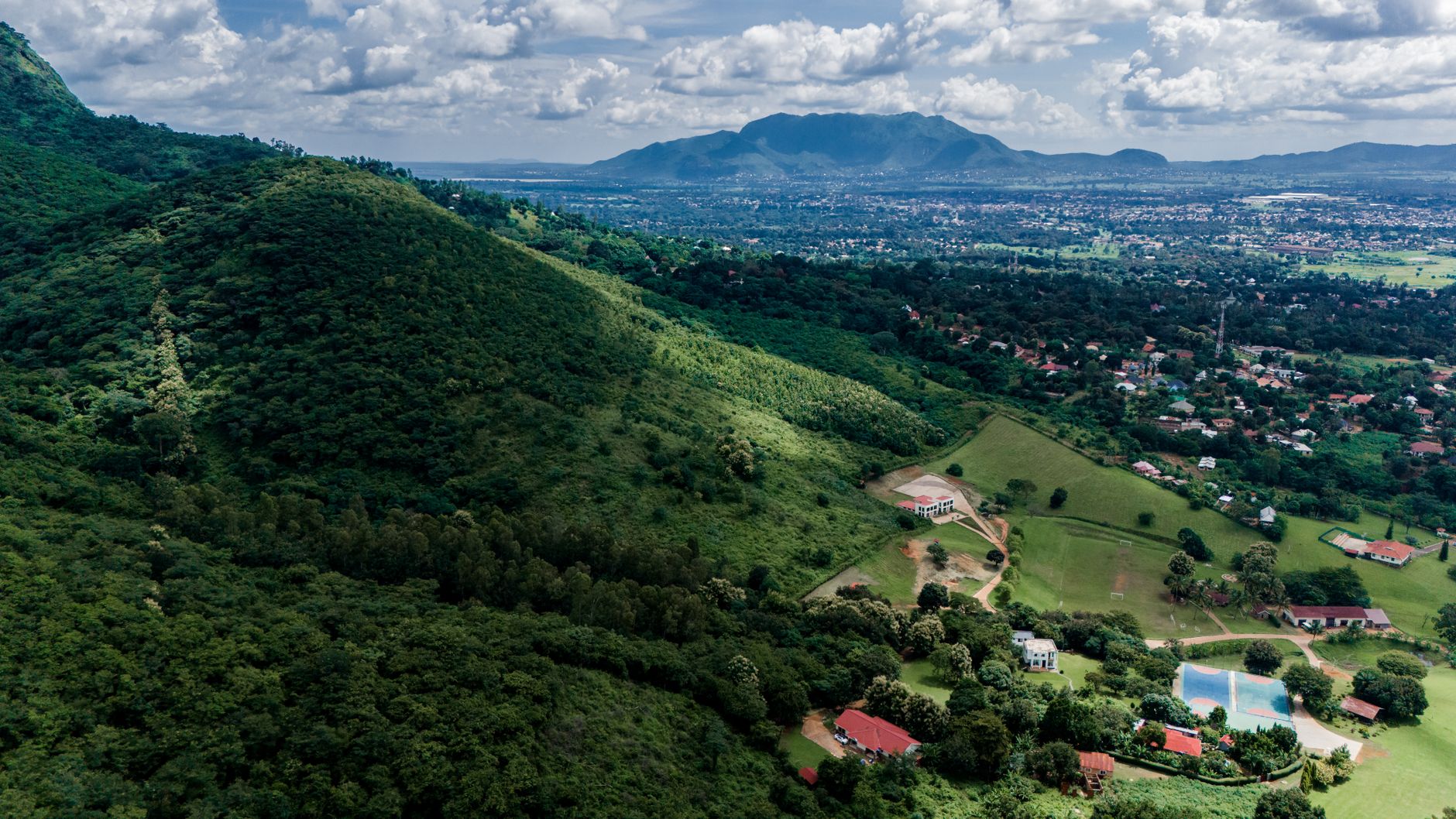 Rolling green hills and farmland viewed from a ridge in the Usambara Mountains