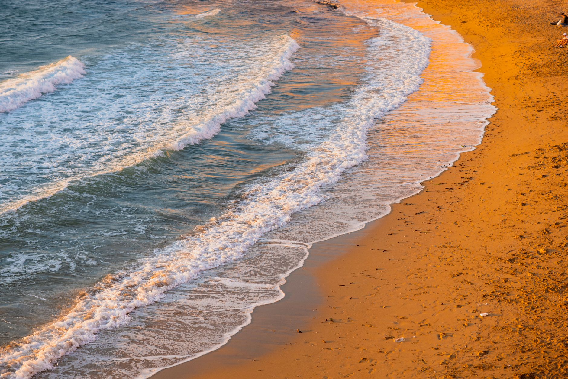 Calm turquoise water along a quiet Mediterranean coastline