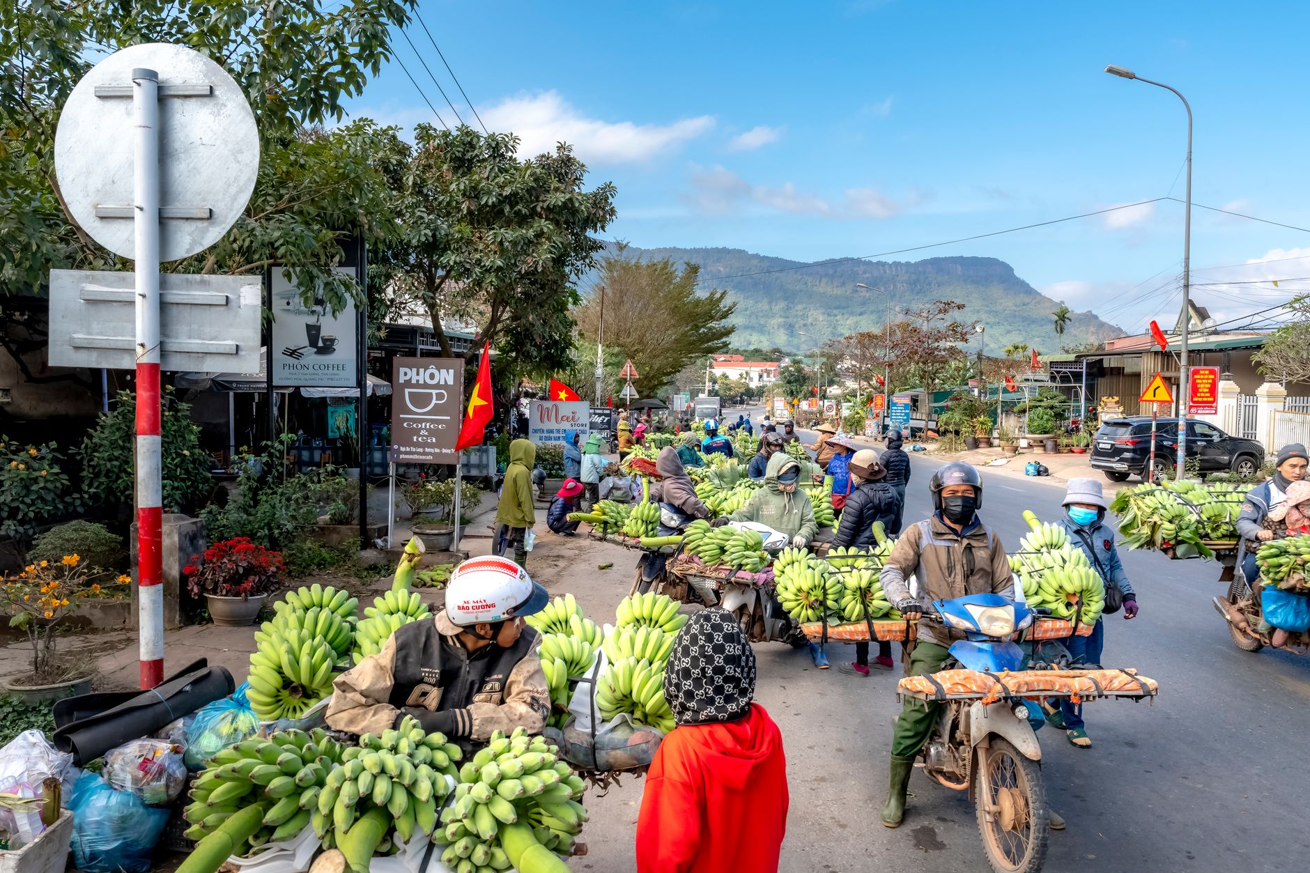 A colorful weekly market in a northern Vietnamese mountain town with local vendors