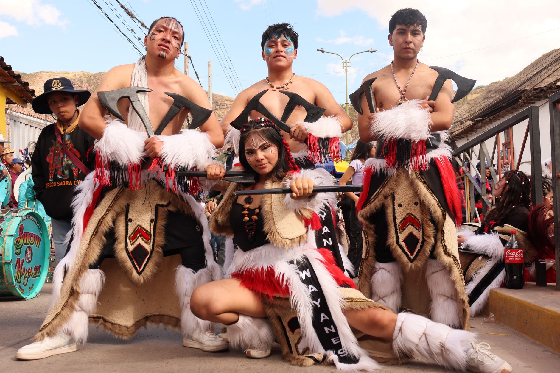 Colorful traditional ceremonial dress and headdress worn during a cultural festival