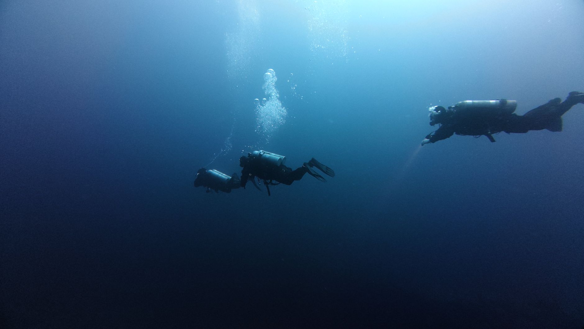 Clear blue Red Sea water with coral reef visible beneath the surface