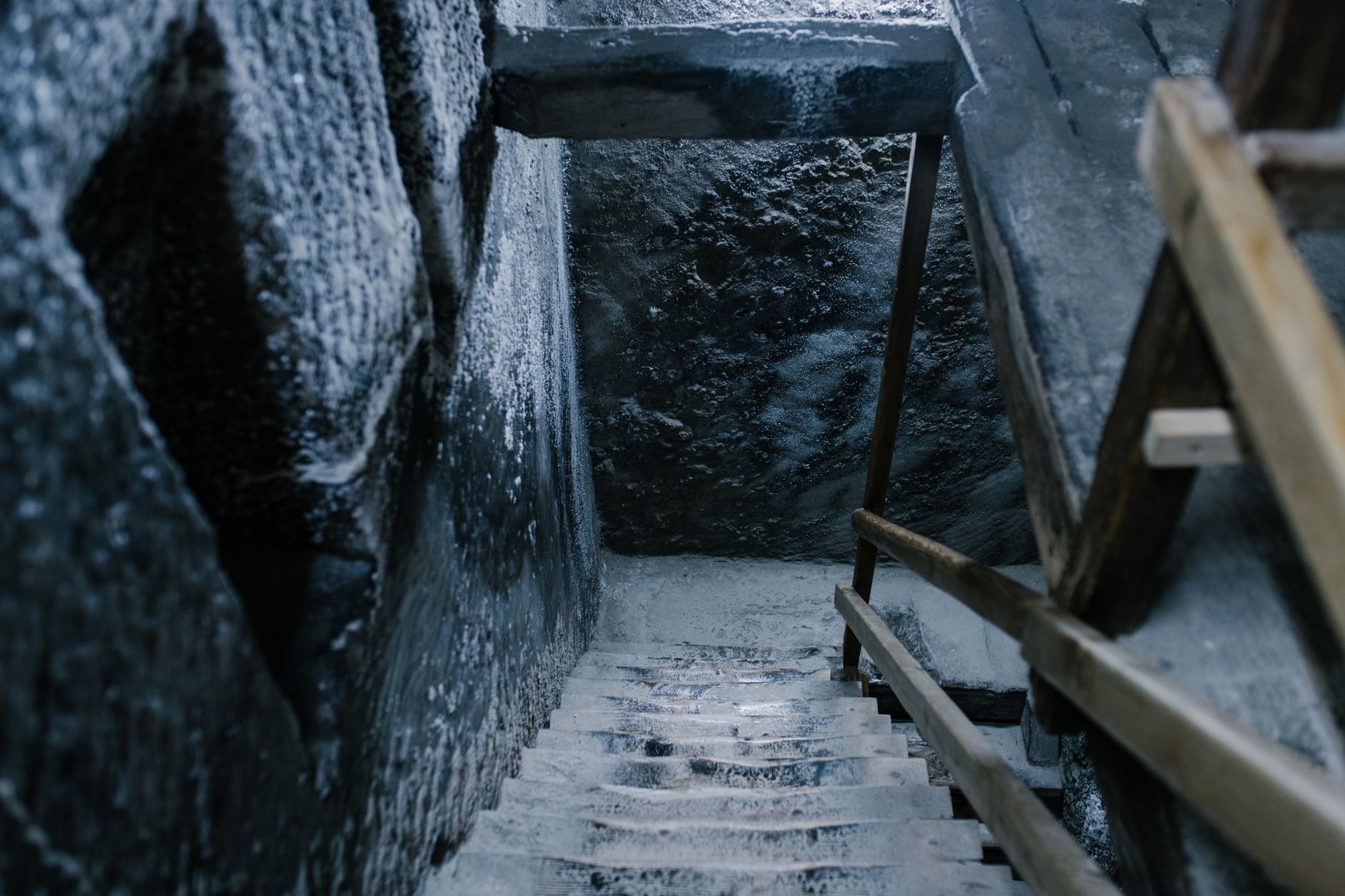 Interior of a salt cave with crystalline formations and translucent walls