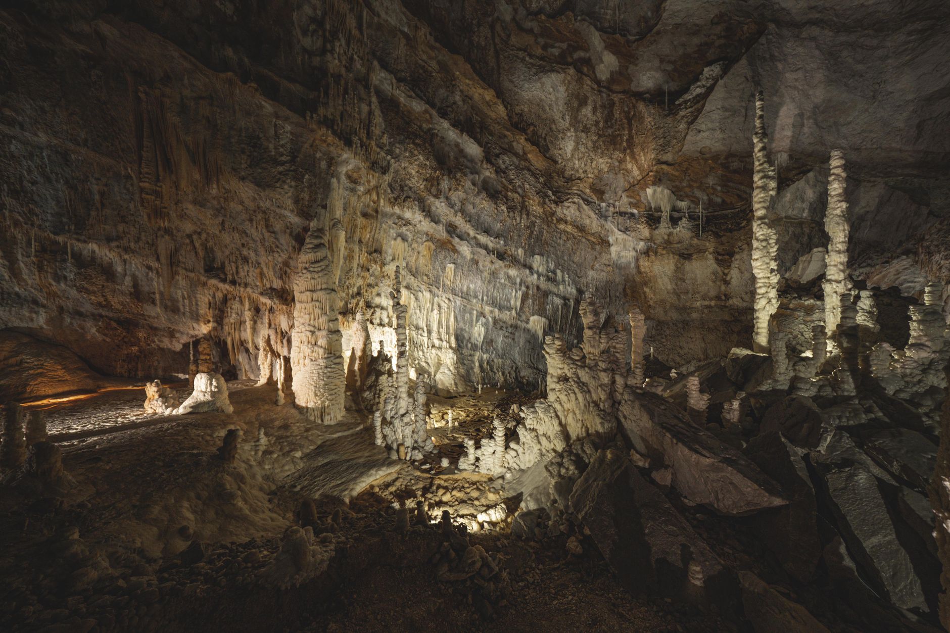 Ancient rock art paintings on a cave wall in a desert environment
