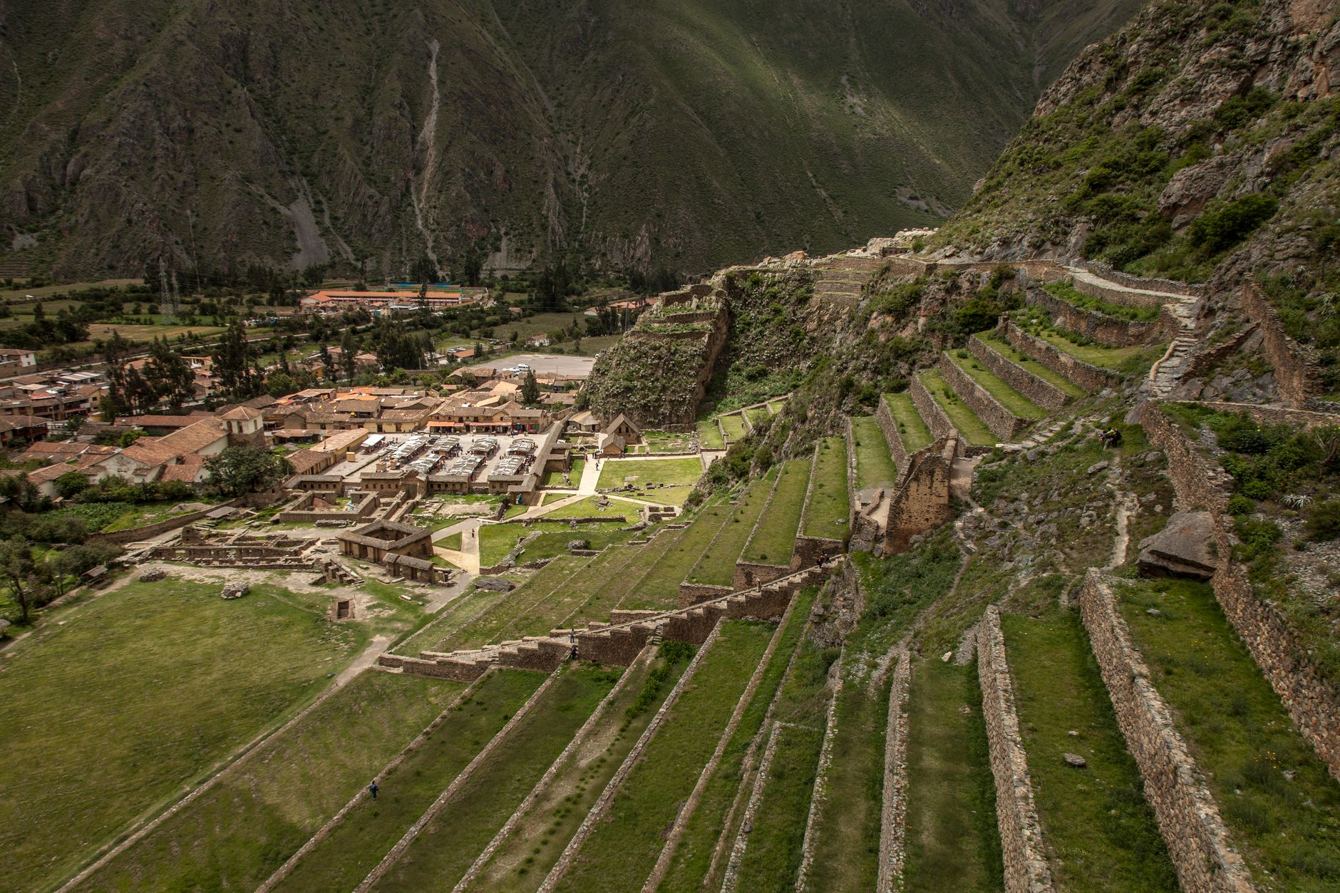 Remote Andean village surrounded by open altiplano grassland at high altitude